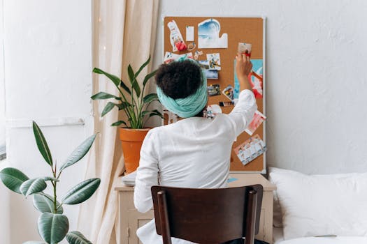 a balanced workspace with plants and personal items