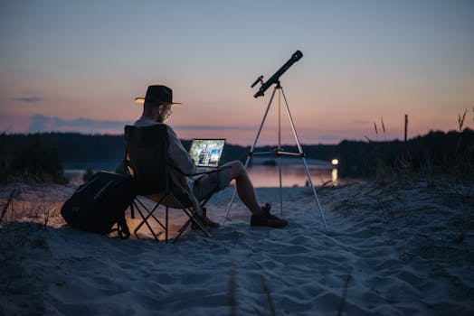 a digital nomad on a beach with a laptop