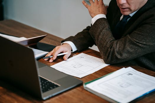 professor working on a laptop